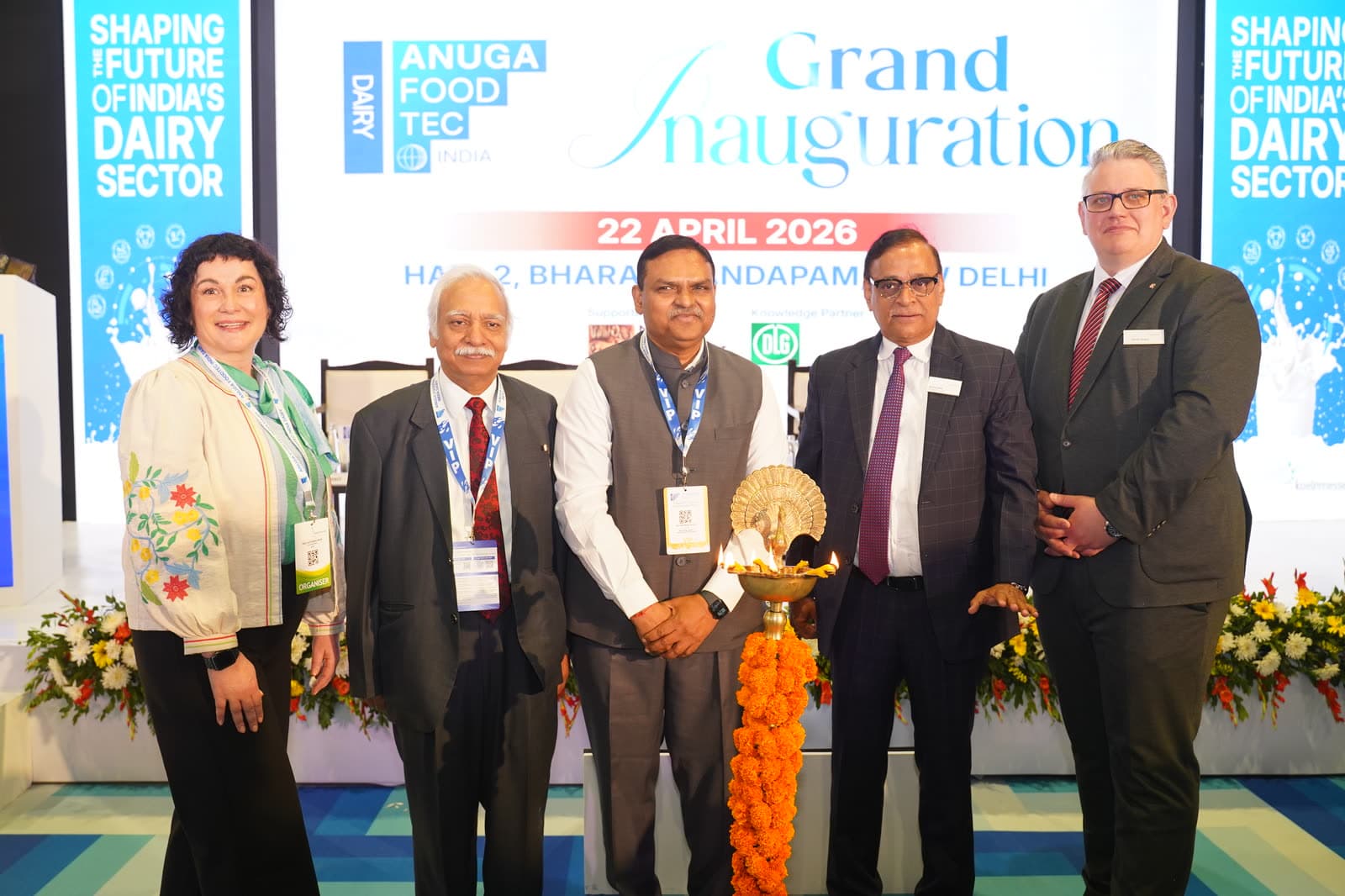 Dignitaries lighting the ceremonial lamp at the opening